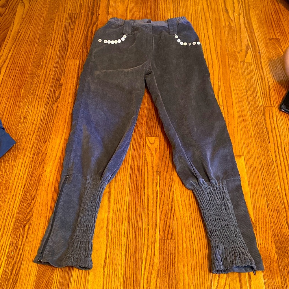 Jeans that’s are grey baggy from the top , tight bottom size 12, vintage .